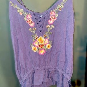 Aeropostale top with floral sewing.